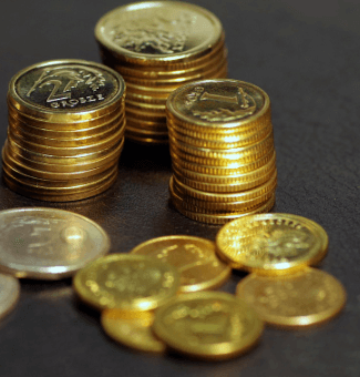 Close-up view of IRS-approved gold coins for retirement accounts